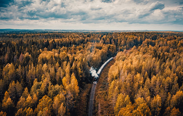 Old soviet steam locomotive passing though Karelian forrest