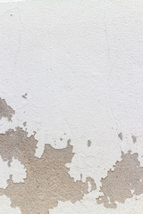 wall with peeling paint surface