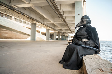 plague doctor in an empty city on an empty marina