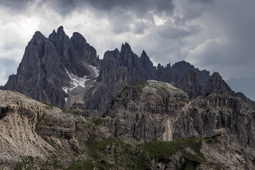 Fototapeta na wymiar Moody picture of Cadin di Misurina mountains, covered in clouds in bad weather. Cortina d'Ampezzo, Italy