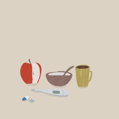 体温計とりんごとボウルとカップと薬の錠剤とカプセル
