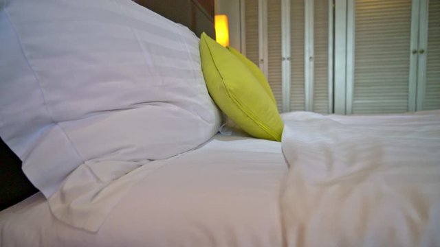 comfortable pillow decoration on bed in hotel bedroom