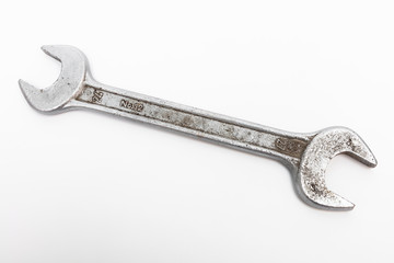 old wrench on white background