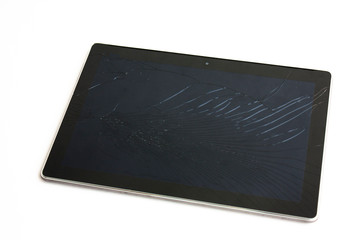 Broken tablet screen. A damaged gadget that can or cannot be restored or repaired