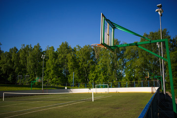 Basketball court in a green Park. Basket for playing basketball close-up.