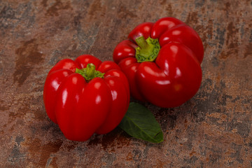 Ripe Red bell pepper over wooden