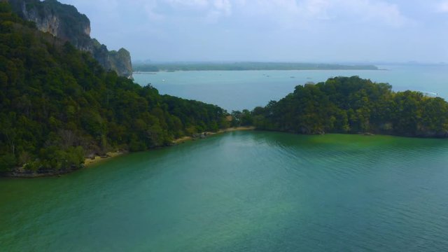 drone shot of amazing tropical island and big rocks