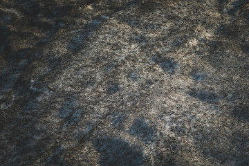 The texture of the snow. Dirty spring snow. Abstract black texture.