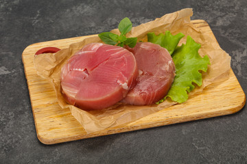 Raw tuna round steak for grill