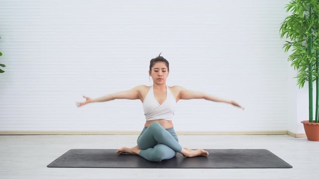 Young woman doing yoga.