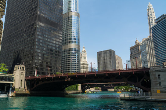 Low Angle View Of Bridge Over Chicago River Against Buildings In City