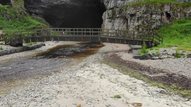 Aerial footage revealing Scotlands famous Smoo Caves boasting one of the largest indoor caves on th United Kingdom coastline. Captured on the North Coast 500.