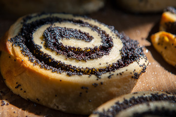 Homemade sweet bun rolls with poppy seeds. Pastries