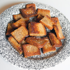 tosted bread pieces on a plate