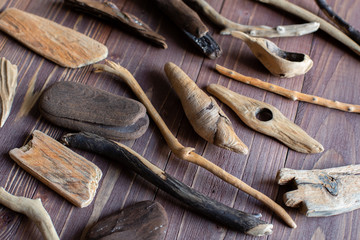 pieces of wood, sticks, driftwood from the sea, smooth and rough wood texture. natural materials for creativity, crafts, eco friendly creativity