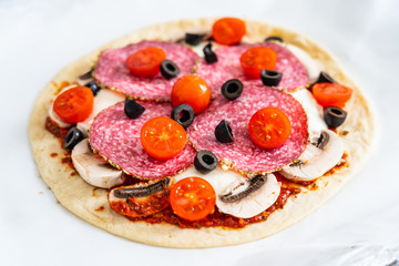 Margherita pizza on white paper