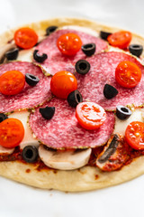 Margherita pizza on white paper