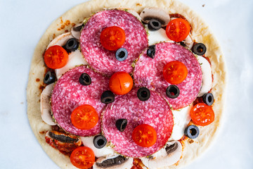 Margherita pizza on white paper