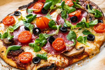 Margherita pizza on baking paper
