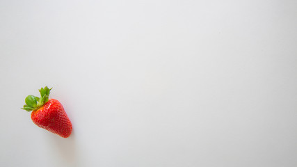 One strawberry for white background