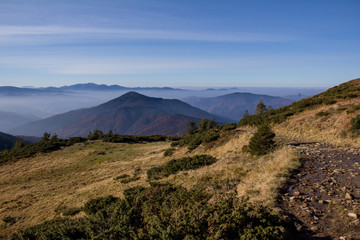 Fototapeta na wymiar mountain landscape with blue sky and clouds
