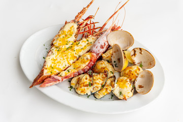 An assortment of baked seafood with cream and cheese