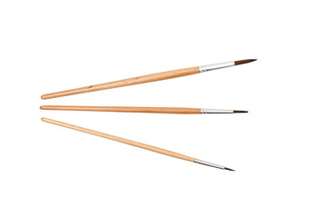 three brushes for painting isolated on white background
