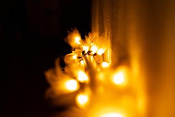Glittery warm and comfortable lights on a stairrail