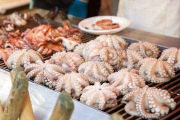 Fried octopus on the counter of street shop