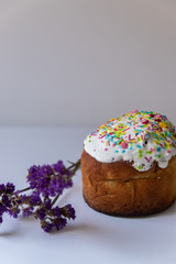 Glazed easter cake  on white marble background. Traditional food 