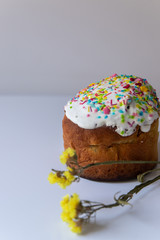Glazed easter cake  on white marble background. Traditional food 