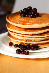 pancakes with blueberries and syrup