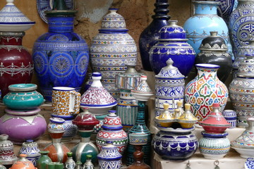 Close-up of beautiful handmade ceramic pottery on display in a shop of the medina of Marrakesh
