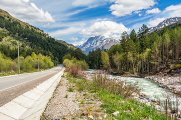 Fototapeta premium Federal highway A-158 and the Baksan river, near the village of Terskol. Elbrus region.