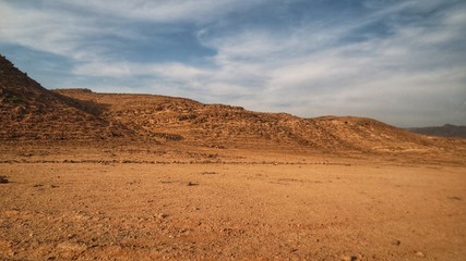Fototapeta na wymiar Dry Mountains in Salalah, Oman