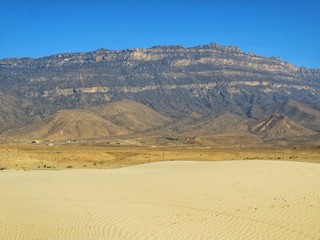 Fototapeta na wymiar Dry Mountains in Salalah, Oman