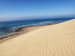 Beautiful Sand dunes  near Ocean in Salalah, Oman