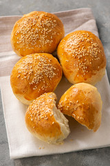 Homemade fresh bread buns with sesame seeds.