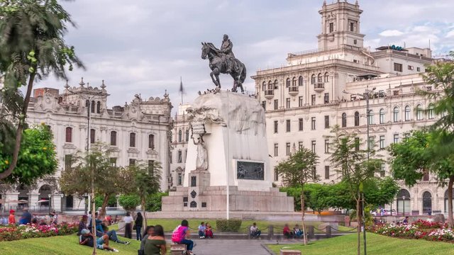 Monument to Jose de San Martin on the Plaza San Martin timelapse in Lima, Peru. Cloudy sky and historic buildings on a background
