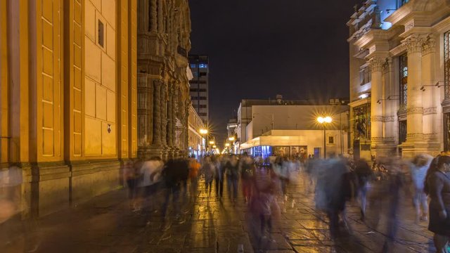 Fast walk on Jiron de la Union, the pedestrian shopping street in old city center night timelapse hyperlapse from Plaza de Armas to Plaza San Martin. Lima, Peru