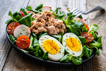 Tuna salad on wooden table