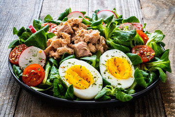 Tuna salad on wooden table