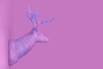 Lots of shiny threads intertwined in the shape of a voluminous deer head on the wall. Christmas concert. 3D illustration