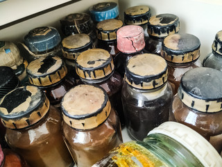 old chemical bottles with various reagents