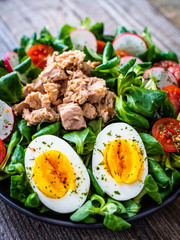 Tuna salad on wooden table