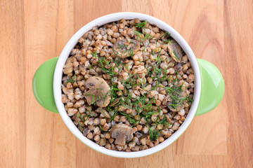 Buckwheat porridge with mushrooms, traditional russian food. Flat layout