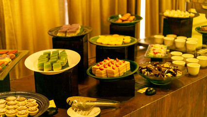 Variety of sweet food on the plate at hotel