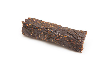 Beef Biltong, South African Beef Jerky isolated on a white studio background.