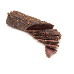 Beef Biltong, South African Beef Jerky isolated on a white studio background.