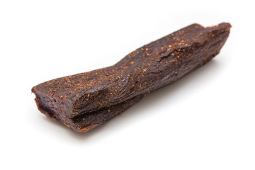 Beef Biltong, South African Beef Jerky isolated on a white studio background.